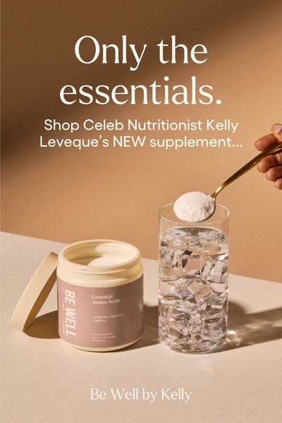 A clean, minimalist product hero image featuring an amino acids supplement container and a glass of water being poured.